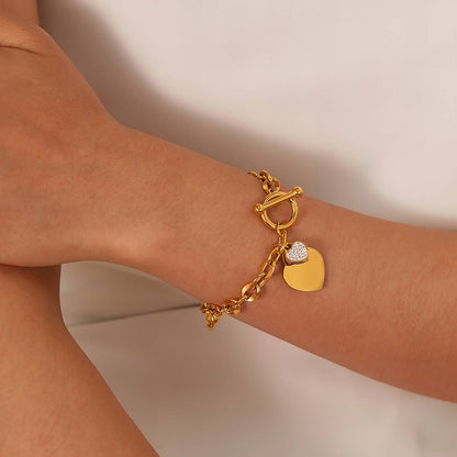 MEA NANI JEWELLERY Armbånd SHE’S GLOWING BRACELET – hjertearmbånd med 18k gullbelegg